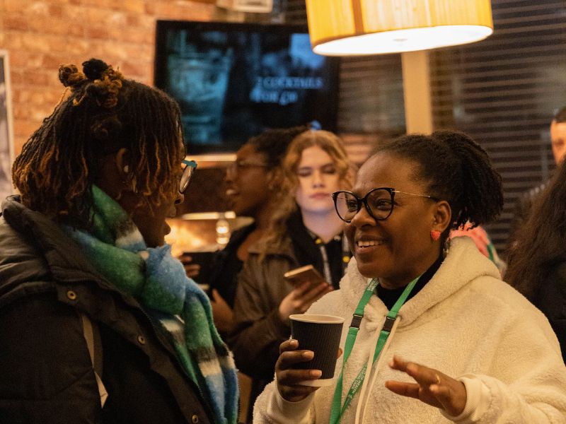 2 essex Students chat in Top Bar