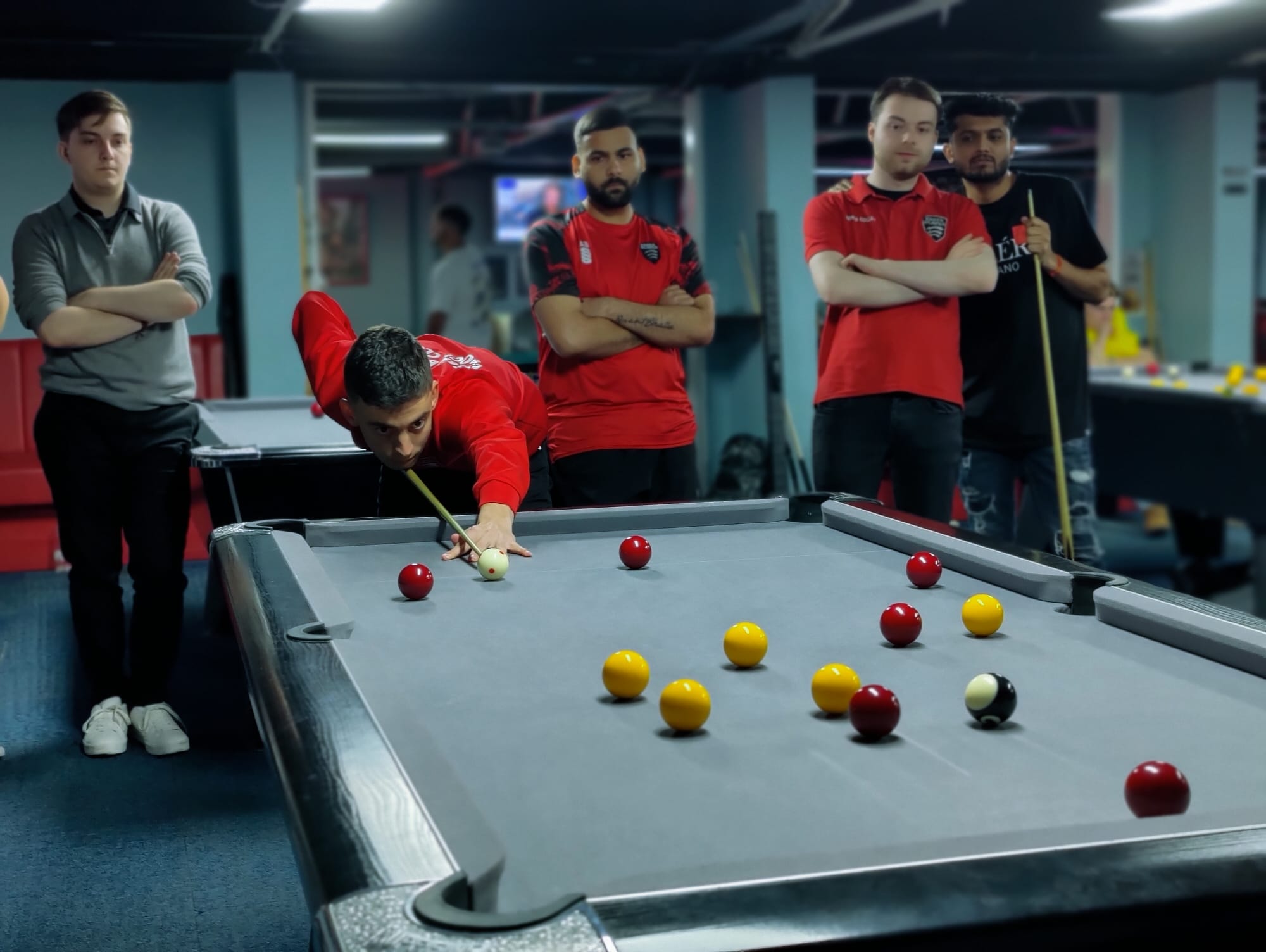 Essex Blades Pool team playing pool