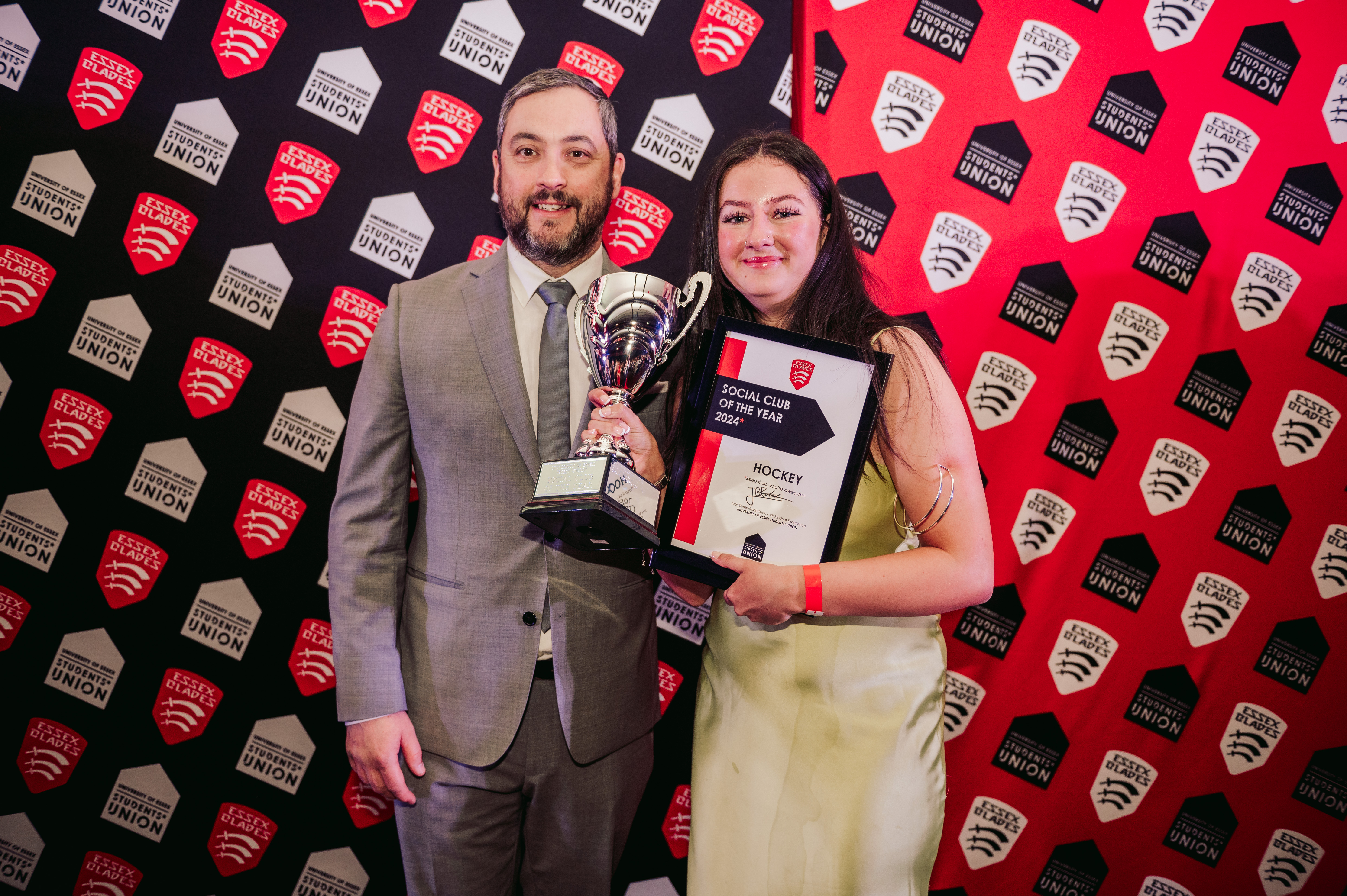 Essex blades Hockey teammate accepting an award at sports awards