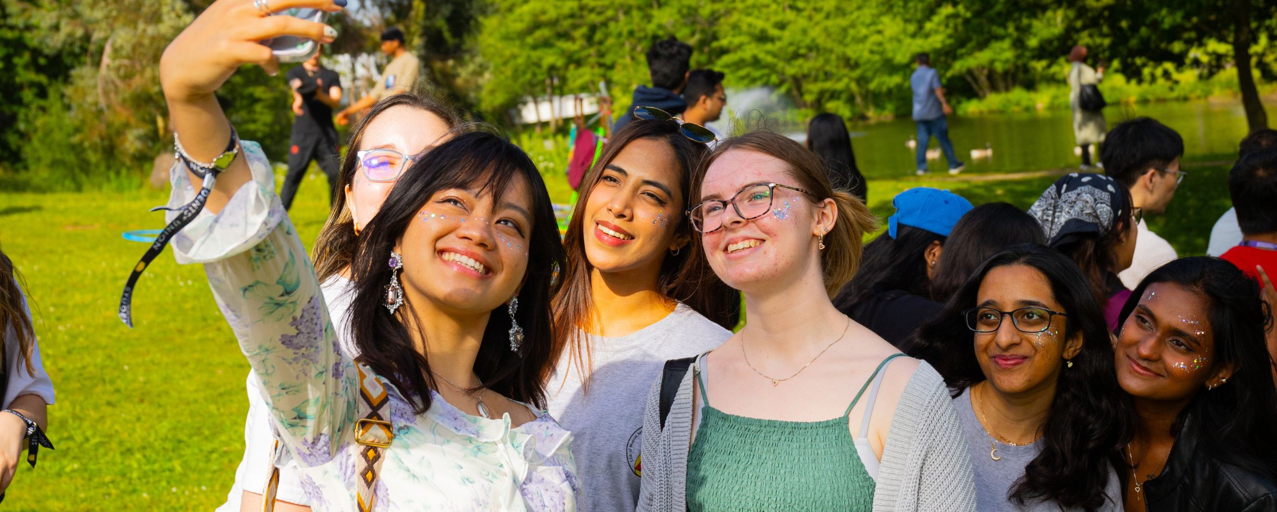 essex su female students taking a photo