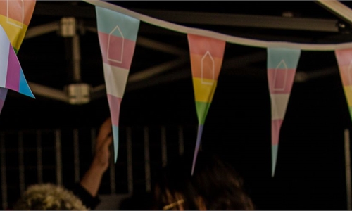 Pride flags with essex su logo